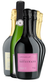 Sechs Flaschen Festtagspaket Sekt stehend, mit goldenen und schwarzen Folienverschlüssen, rosa, weißen und gelben Etiketten. KOSTENLOSER VERSAND*.