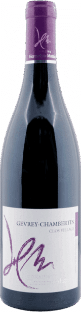 Eine Flasche Heresztyn Mazzini 2020 Gevrey Chambertin Vielles Vignes Cuvée Les Jouises, mit violetten und weißen Akzenten und einer stilisierten Unterschrift auf dem Etikett. Der lilafarbene Verschluss hat einen passenden Text.