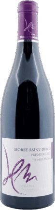 Eine Flasche Heresztyn Mazzini | 2020 Morey Saint Denis Premier Cru Les Millandes, mit violetter Kapsel und weißem Etikett mit Signatur.