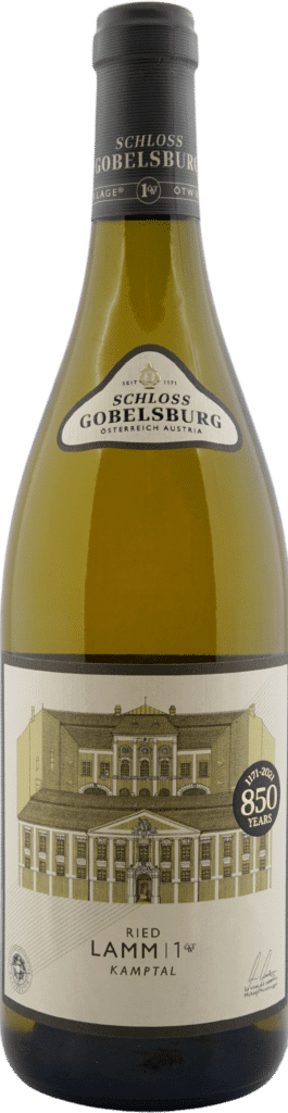 Eine Flasche Schloss GOBELSBURG 2023 Grüner Veltliner Ried Lamm Erste Lage 1ÖTW Kamptal DAC mit historischer Gebäudeabbildung, goldenem "850 Jahre"-Emblem und schwarz-goldenen Akzenten auf Hals und Etikett.